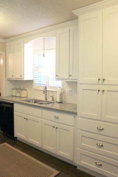 Remodeled white shaker kitchen with quartz counters after